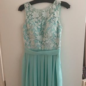 Turquoise formal dress with white lace